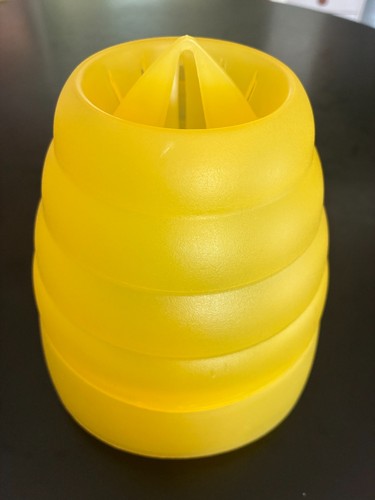 Yellow plastic beehive honey - plastic,