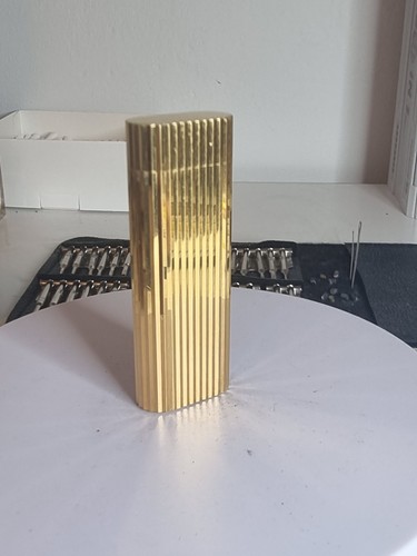 Cartier lighter gold plague - cartier,
