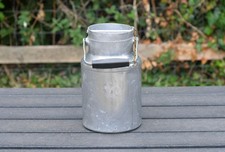 Vintage old aluminium milk