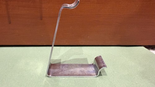 Spring steel clip for - spring, wooden