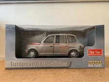 SUN STAR TX1 LONDON TAXI CAB 1998 1/18 IN BOX C5