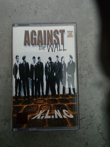 Xlnc against the wall - -,