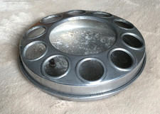 A CIRCULAR-SHAPED, 112g, RETRO