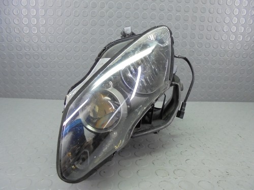 Left front headlight damaged - front,