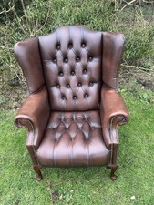 brown leather Wingback  chair