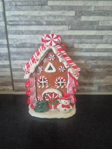 Frosty candy cane cottage
