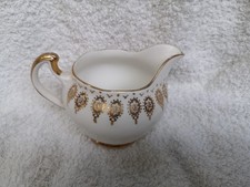 Royal Vale bone china milk jug with gold scroll motif