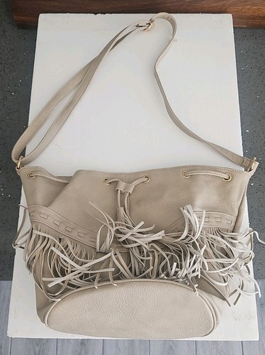 Pretty tassled cream - pretty, cross