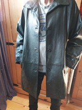 Women's Black Leather Coat Size 38. 3ins L 22ins Wide With Button Accents Sides.