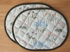 Pair of Quilted Oval Table
