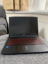 MSI Katana GF66 Gaming Laptop, with Charger and Case.