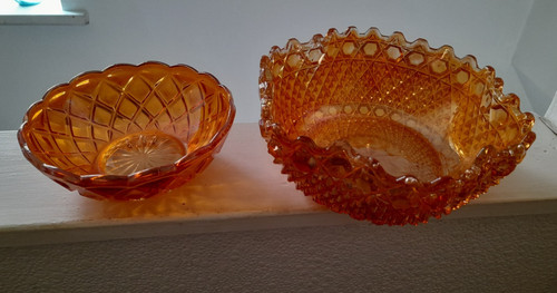 Two vintage orange - glass, bowls