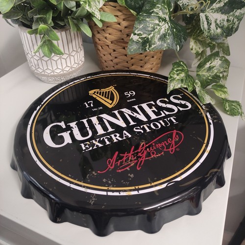 Guinness hanging bottle cap - -,