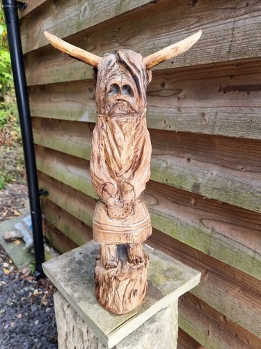 Chainsaw carved highland - chainsaw,