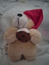 Christmas Bear Holding A Pudding Toy