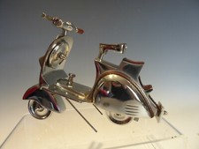 POLISHED STEEL AND LEATHERED