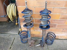 Capri 2.8i Bilstein Mcpherson Struts and 2 prs of 145lb -2inch R/Design Springs.