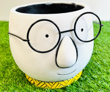 Cement face planter with - face,