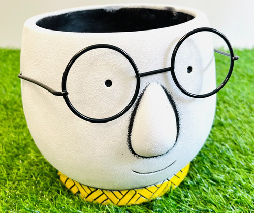 Cement face planter with - face,