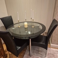 Glass round dining table and 4