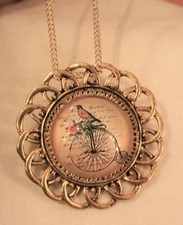 Loop Rim Robin Red Breast on an Old Fashioned Bicycle Goldtone Necklace Brooch