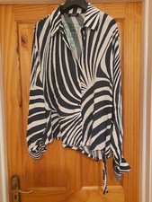 Tuzzi blouse size 12