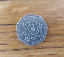 50p coin 2010  CELEBRATING 100 YEARS OF GIRLGUIDING UK  COLLECTABLE CIRCULATED