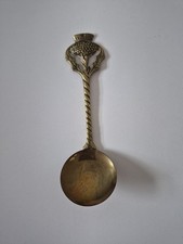 Vintage brass spoon with thistle detail