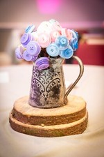 Handmade & Unique Button Bouquets in rustic watering cans wedding centerpieces