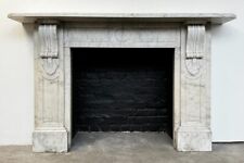 A substantial antique Victorian Corbelled Carrara marble fireplace surround