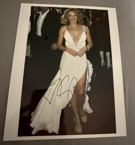 Kylie minogue signed picture - minogue,