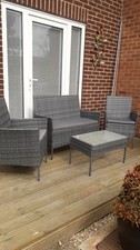 RATTAN PATIO SET. 2 CHAIRS 1 BENCH & 1 TEMPERED GLASS COFFEE TABLE ALL EX COND!!