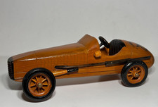 Varnished wooden racing car