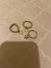 Set Of Three Gold Tone Stretch Brad Rings From Bohemian