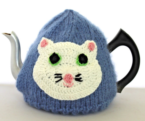 Hand knitted blue cup tea - hand,