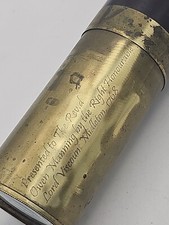 Antique brass telescope by the