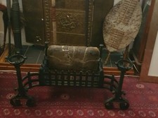 Art Deco iron fire basket with incorporated scrolled and Fire Dogs