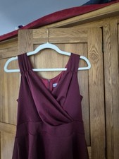 Size 12 Grace Karin Dress, Never Worn flattering, hides the tummy. rich Burgundy