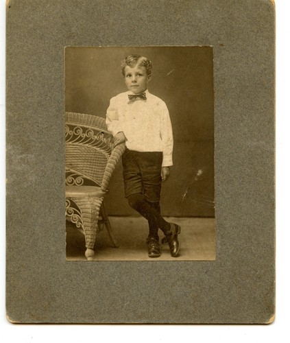 Little boy standing wicker - standing, by