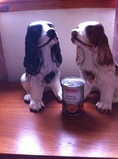 PAIR OF VINTAGE CHALKWARE SPANIELS. 11.5" TALL.