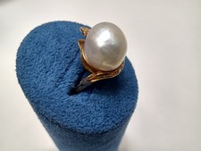 Tested as 18 carat gold and 18ct stamped Mabe Pearl and Diamond ring.