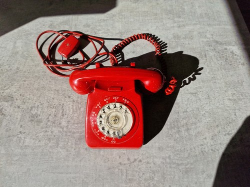Vintage red analog phone with - red,