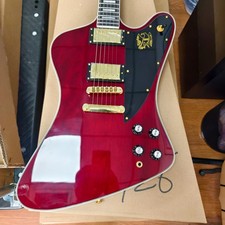Red Firebird electric guitar