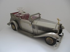 Vintage Rolls Royce musical decanter with 6 Shot Glasses. 1970's?. See all pic's