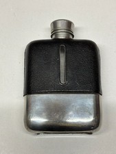 VINTAGE LEATHER AND SILVER HIP FLASK MADE IN ENGLAND.