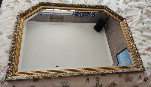 Large mirror with ornate - an,