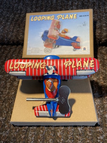 Tinplate clockwork plane - clockwork, adult