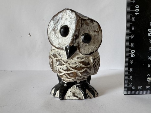 Hand carved wooden owl - hand,