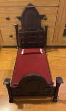 Antique wood doll bed with