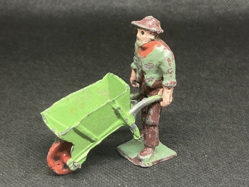 Gardener with wheelbarrow - gardener,